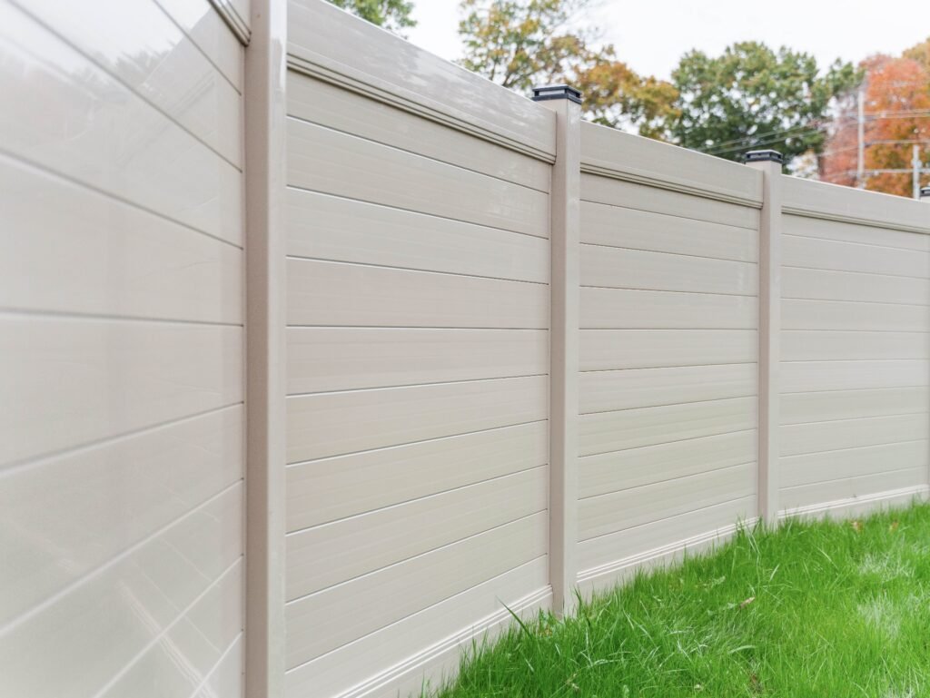Finished vinyl fence installation